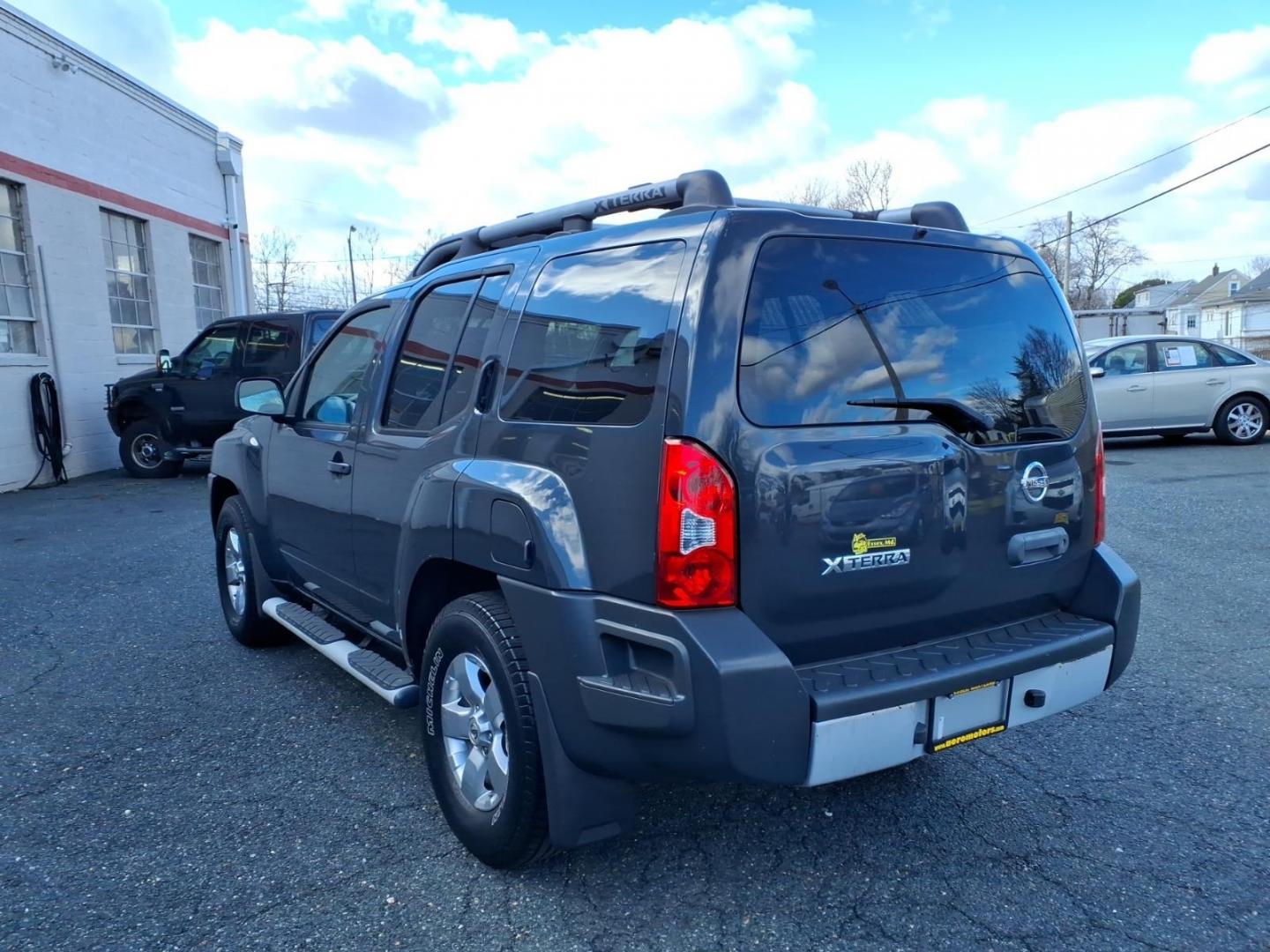 2010 Night Armor Nissan Xterra S (5N1AN0NU9AC) with an 4.0L 4.0L V6 261hp 281ft. lbs. Fuel Injected engine, 5-Speed Automatic transmission, located at 50 Eastern Blvd., Essex, MD, 21221, (410) 686-3444, 39.304367, -76.484947 - Photo#2