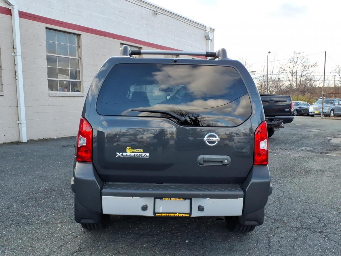 2010 Night Armor Nissan Xterra S (5N1AN0NU9AC) with an 4.0L 4.0L V6 261hp 281ft. lbs. Fuel Injected engine, 5-Speed Automatic transmission, located at 50 Eastern Blvd., Essex, MD, 21221, (410) 686-3444, 39.304367, -76.484947 - Photo#3