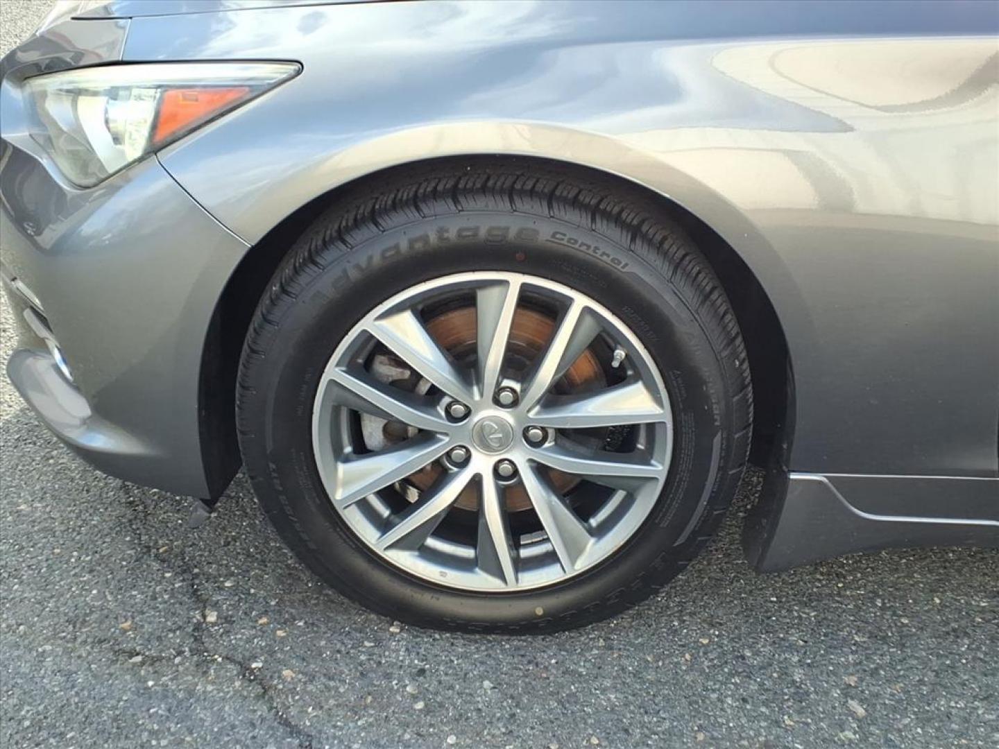 2014 Graphite Shadow INFINITI Q50 Premium (JN1BV7AR9EM) with an 3.7L 6 Cylinder Sequential-Port F.I. engine, ATV6 transmission, located at 50 Eastern Blvd., Essex, MD, 21221, (410) 686-3444, 39.304367, -76.484947 - Photo#7