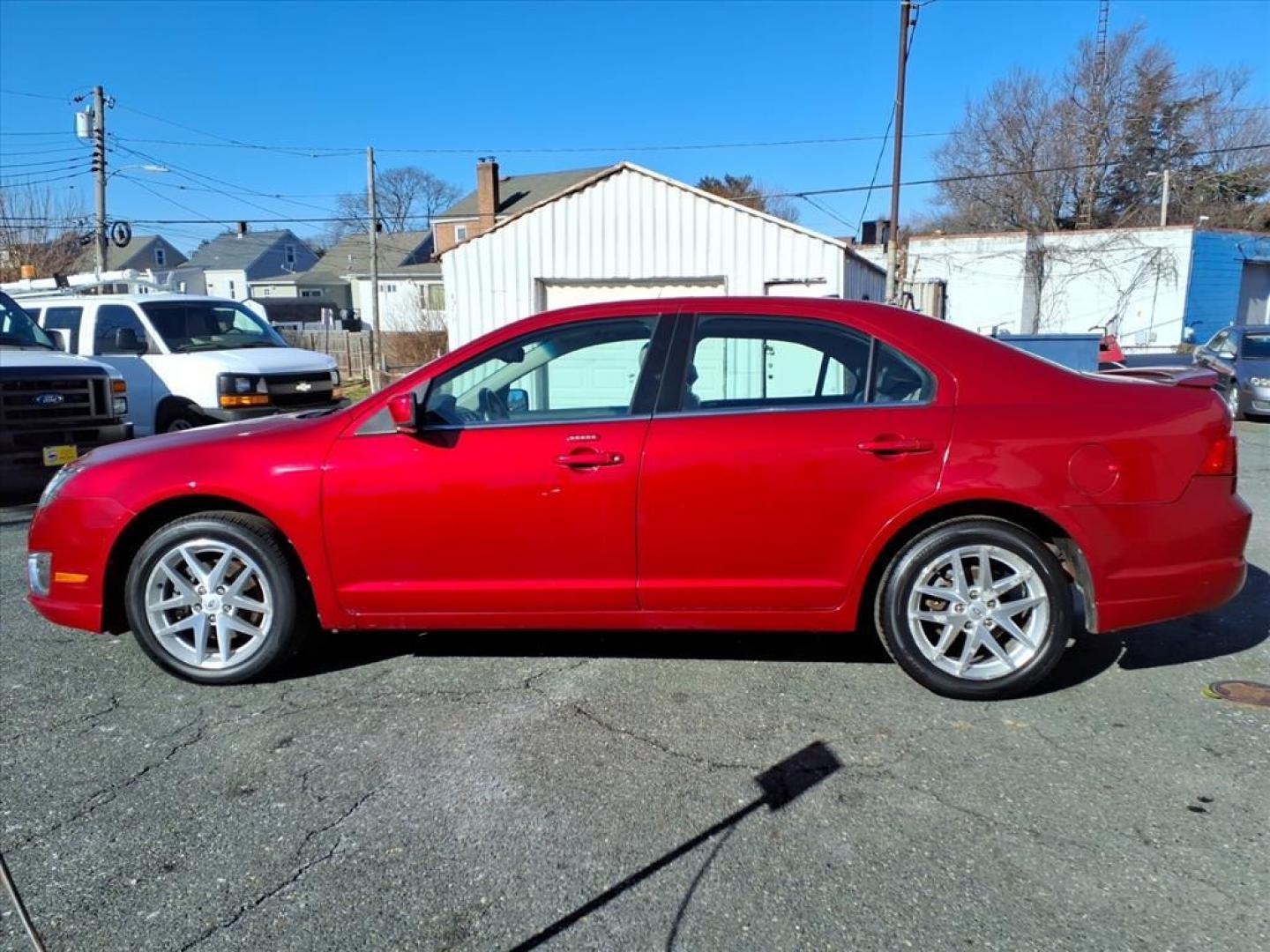 2012 Red Ford Fusion SEL (3FAHP0JA5CR) with an 2.5L 4 Cylinder Sequential-Port F.I. engine, Automatic transmission, located at 50 Eastern Blvd., Essex, MD, 21221, (410) 686-3444, 39.304367, -76.484947 - Photo#1