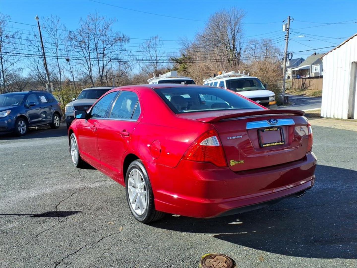 2012 Red Ford Fusion SEL (3FAHP0JA5CR) with an 2.5L 4 Cylinder Sequential-Port F.I. engine, Automatic transmission, located at 50 Eastern Blvd., Essex, MD, 21221, (410) 686-3444, 39.304367, -76.484947 - Photo#2