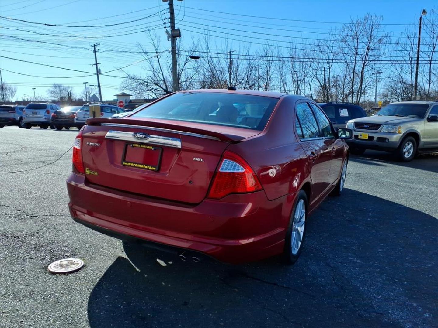 2012 Red Ford Fusion SEL (3FAHP0JA5CR) with an 2.5L 4 Cylinder Sequential-Port F.I. engine, Automatic transmission, located at 50 Eastern Blvd., Essex, MD, 21221, (410) 686-3444, 39.304367, -76.484947 - Photo#4