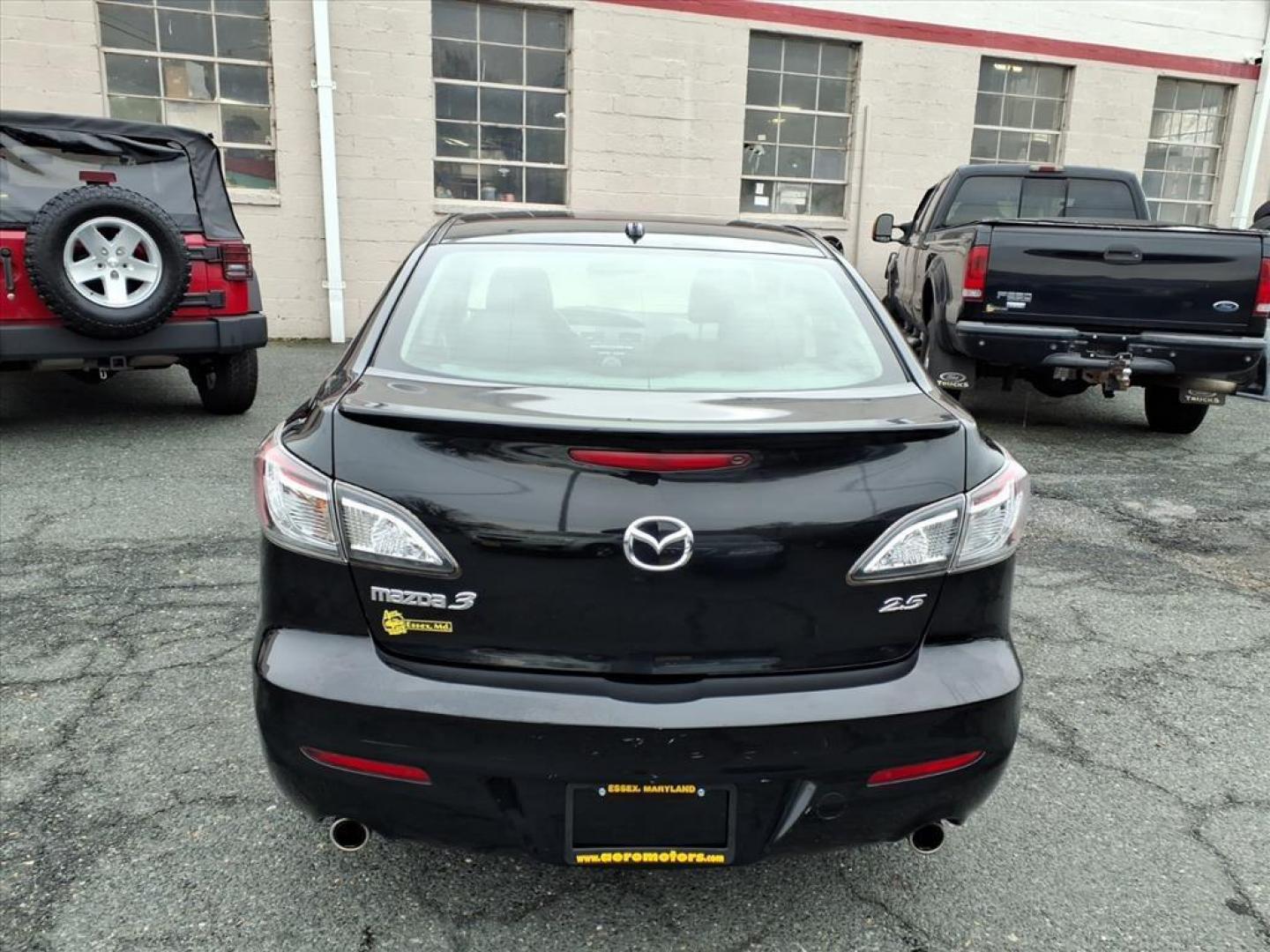 2010 Black Mazda Mazda3 s Grand Touring (JM1BL1S63A1) with an 2.5L 4 Cylinder Sequential-Port F.I. engine, Automatic transmission, located at 50 Eastern Blvd., Essex, MD, 21221, (410) 686-3444, 39.304367, -76.484947 - Photo#3