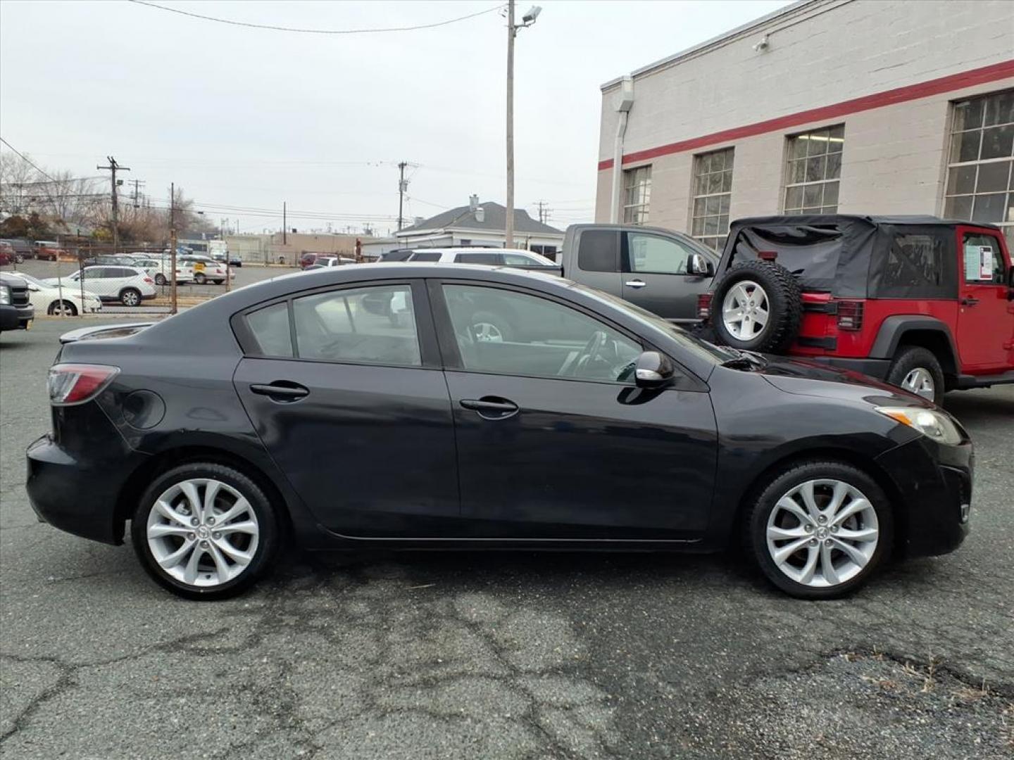 2010 Black Mazda Mazda3 s Grand Touring (JM1BL1S63A1) with an 2.5L 4 Cylinder Sequential-Port F.I. engine, Automatic transmission, located at 50 Eastern Blvd., Essex, MD, 21221, (410) 686-3444, 39.304367, -76.484947 - Photo#5