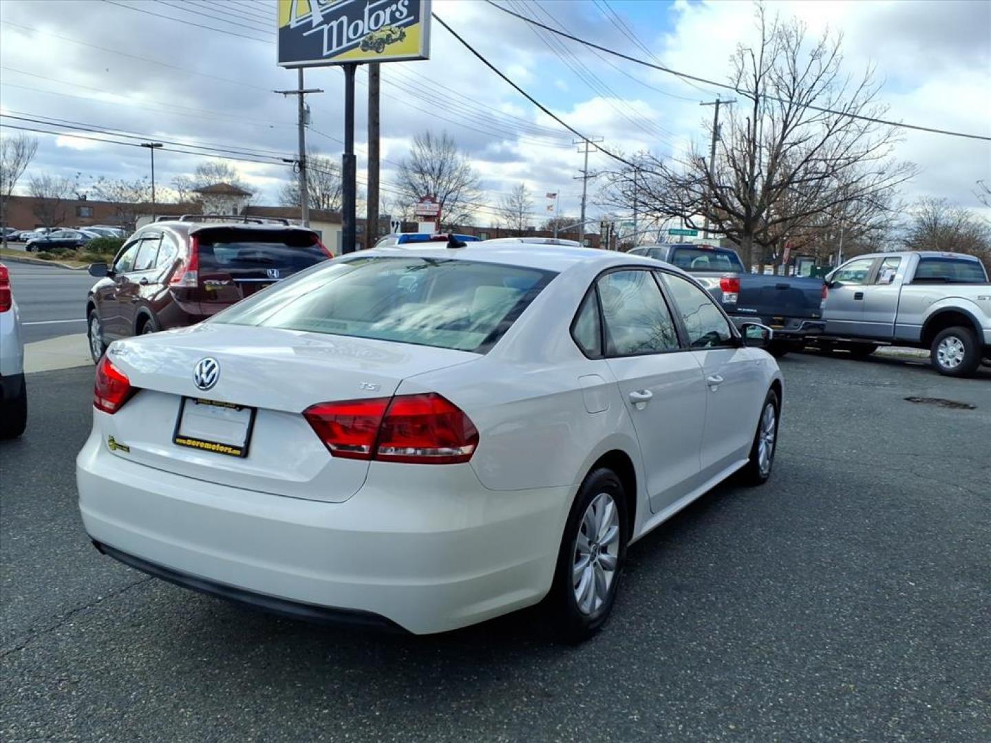 2014 Candy White Volkswagen Passat 1.8T Wolfsburg Edition (1VWAS7A30EC) with an 1.8L 1.8L Turbo I4 170hp 184ft. lbs. Turbocharged engine, 6-Speed Shiftable Automatic transmission, located at 50 Eastern Blvd., Essex, MD, 21221, (410) 686-3444, 39.304367, -76.484947 - Photo#4
