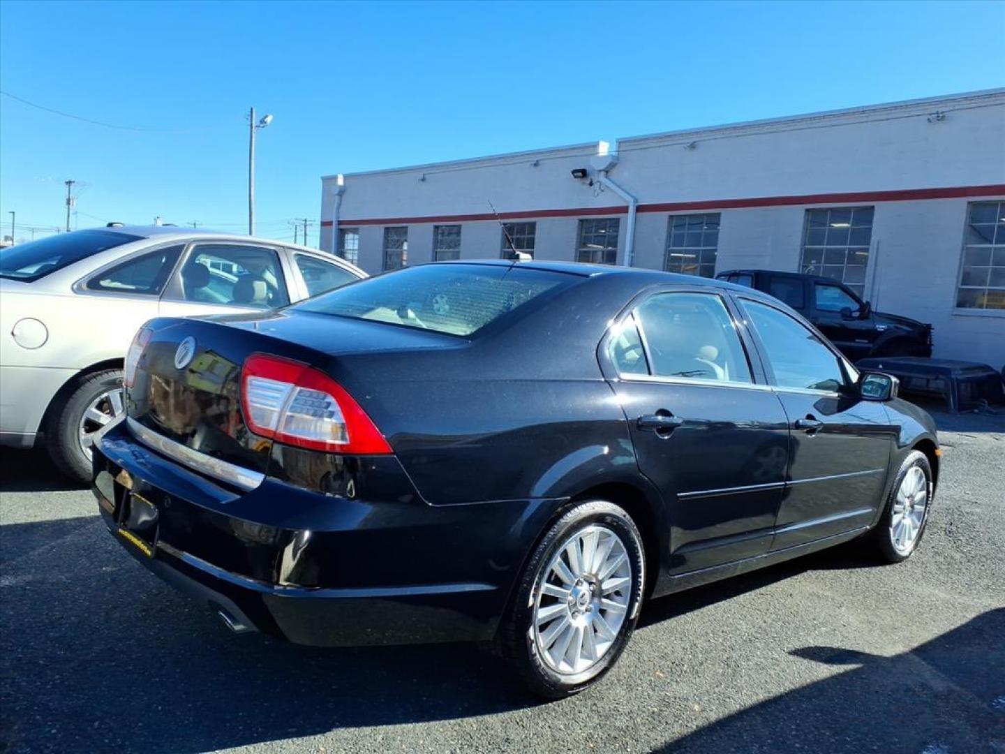 2009 Tuxedo Black Clearcoat Metallic Mercury Milan V6 Premier (3MEHM08109R) with an 3.0L 6 Cylinder Sequential-Port F.I. engine, Automatic transmission, located at 50 Eastern Blvd., Essex, MD, 21221, (410) 686-3444, 39.304367, -76.484947 - Photo#1