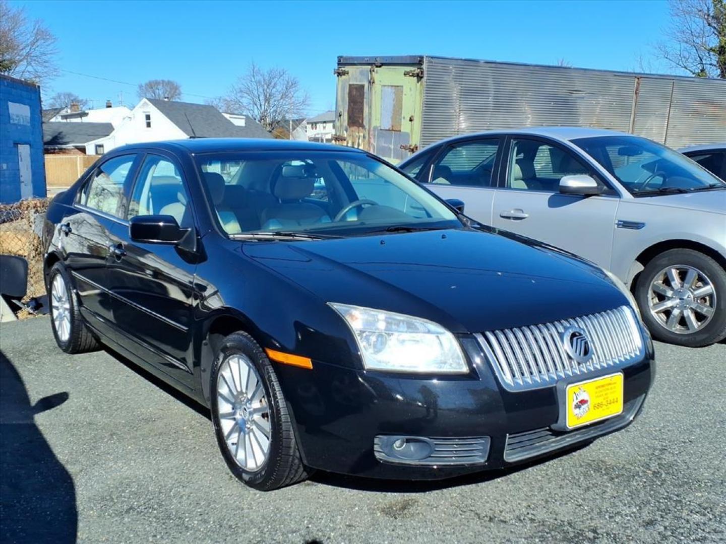 2009 Tuxedo Black Clearcoat Metallic Mercury Milan V6 Premier (3MEHM08109R) with an 3.0L 6 Cylinder Sequential-Port F.I. engine, Automatic transmission, located at 50 Eastern Blvd., Essex, MD, 21221, (410) 686-3444, 39.304367, -76.484947 - Photo#2