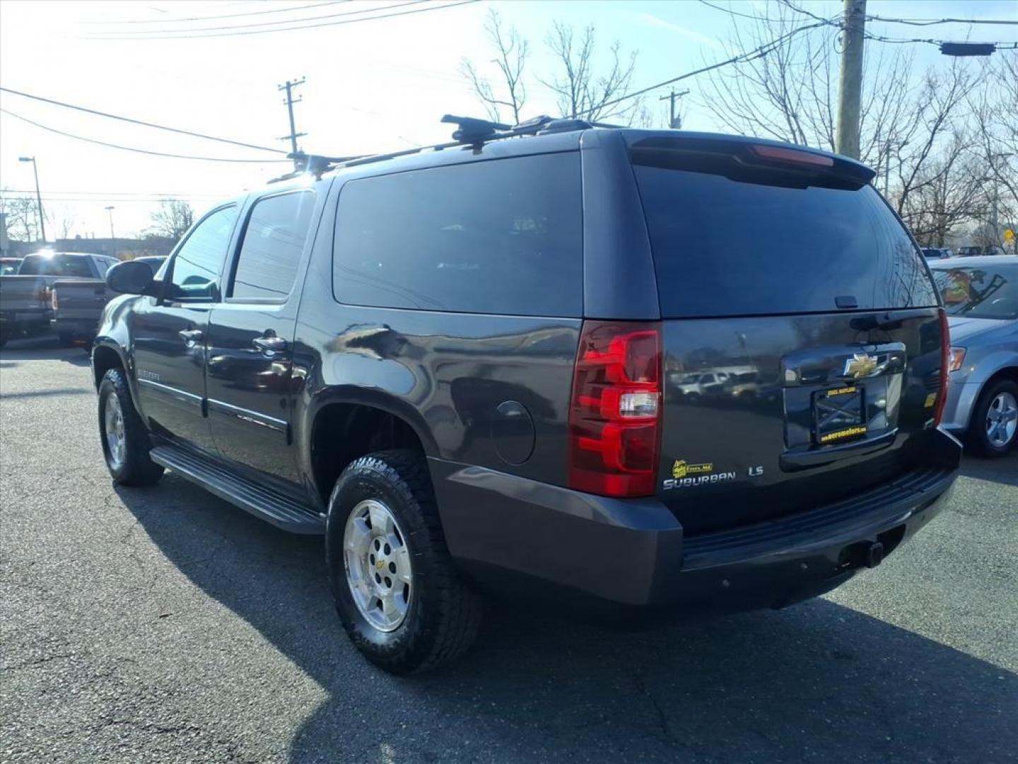 2011 Black 41u Chevrolet Suburban LS (1GNSKHE31BR) with an 5.3L 8 Cylinder Sequential-Port F.I. engine, Automatic transmission, located at 50 Eastern Blvd., Essex, MD, 21221, (410) 686-3444, 39.304367, -76.484947 - Photo#2