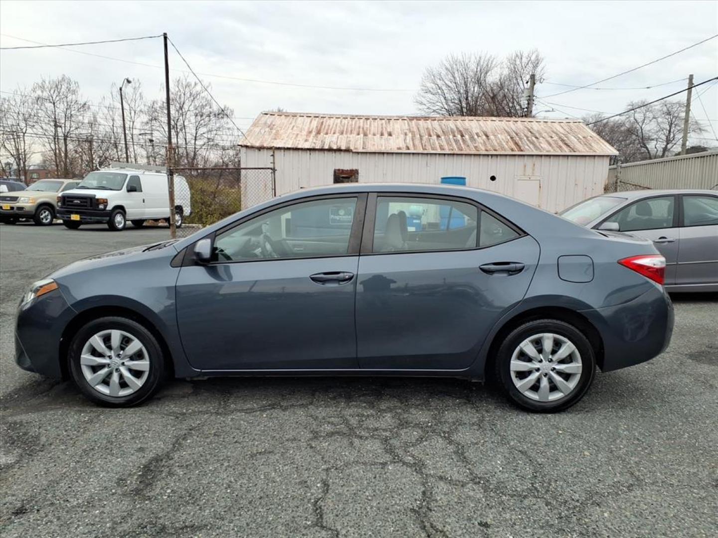 2016 Slate Metallic Toyota Corolla LE (2T1BURHE6GC) with an 1.8L 1.8L I4 132hp 128ft. lbs. Sequential-Port F.I. engine, CVT transmission, located at 50 Eastern Blvd., Essex, MD, 21221, (410) 686-3444, 39.304367, -76.484947 - Photo#1