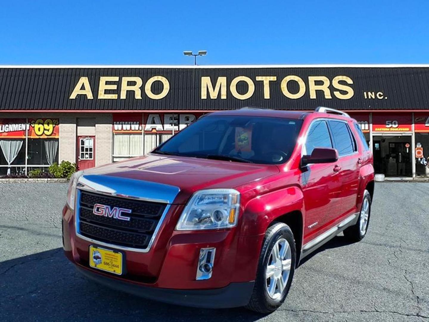 2014 Crystal Red Tintcoat GMC Terrain SLT-1 (2GKFLXE3XE6) with an 3.6L 6 Cylinder Fuel Injected engine, ATAWD transmission, located at 50 Eastern Blvd., Essex, MD, 21221, (410) 686-3444, 39.304367, -76.484947 - Photo#0