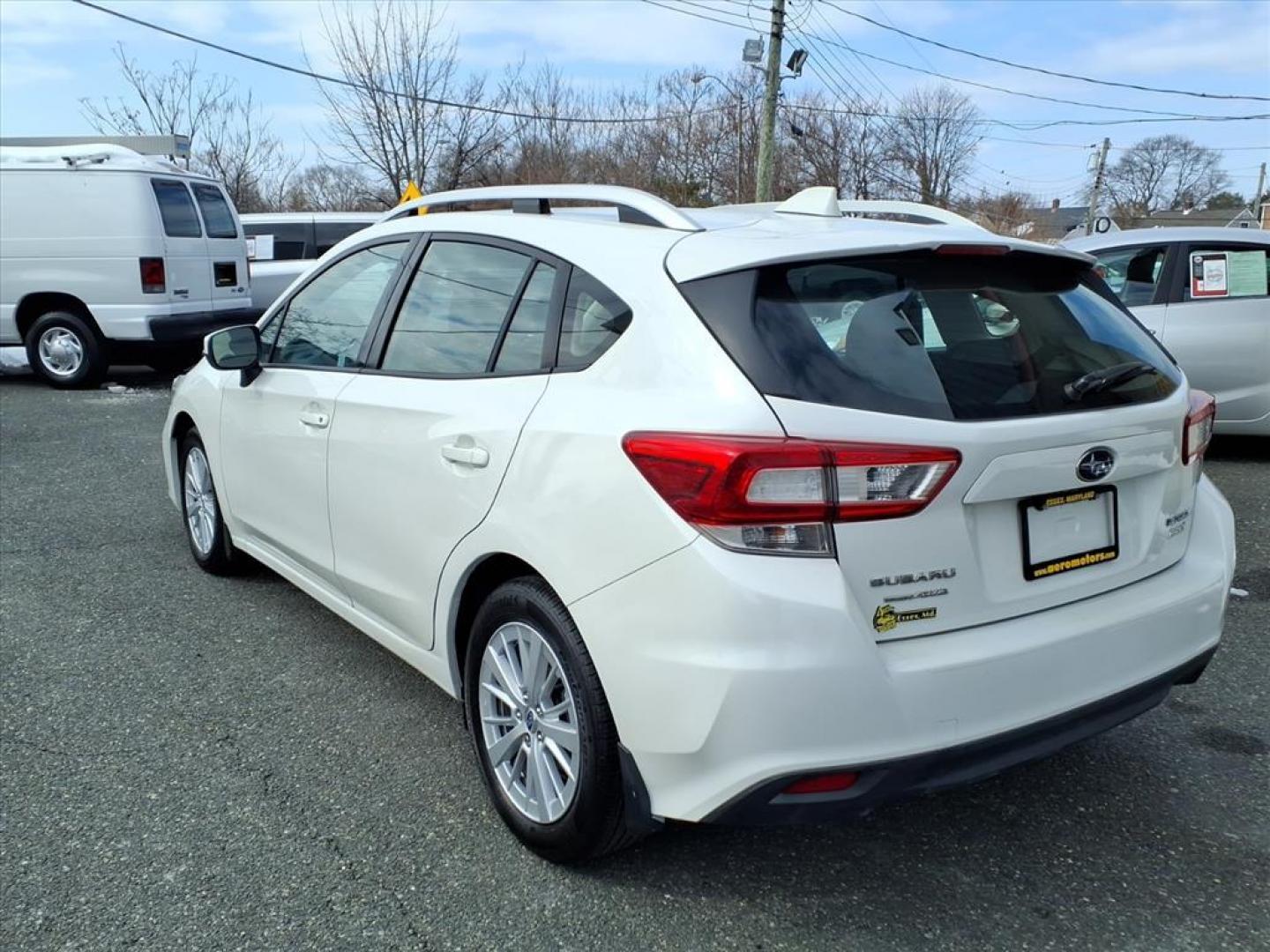 2017 Crystal White Pearl Subaru Impreza Premium (4S3GTAD68H3) with an 2.0L 4 Cylinder Fuel Injected engine, S transmission, located at 50 Eastern Blvd., Essex, MD, 21221, (410) 686-3444, 39.304367, -76.484947 - Photo#2