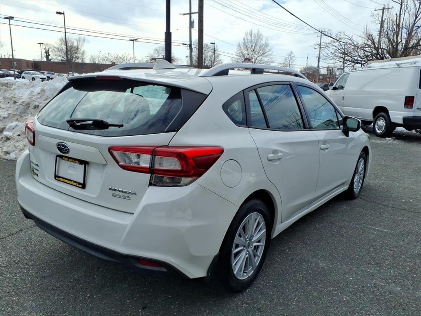 2017 Crystal White Pearl Subaru Impreza Premium (4S3GTAD68H3) with an 2.0L 4 Cylinder Fuel Injected engine, S transmission, located at 50 Eastern Blvd., Essex, MD, 21221, (410) 686-3444, 39.304367, -76.484947 - Photo#5