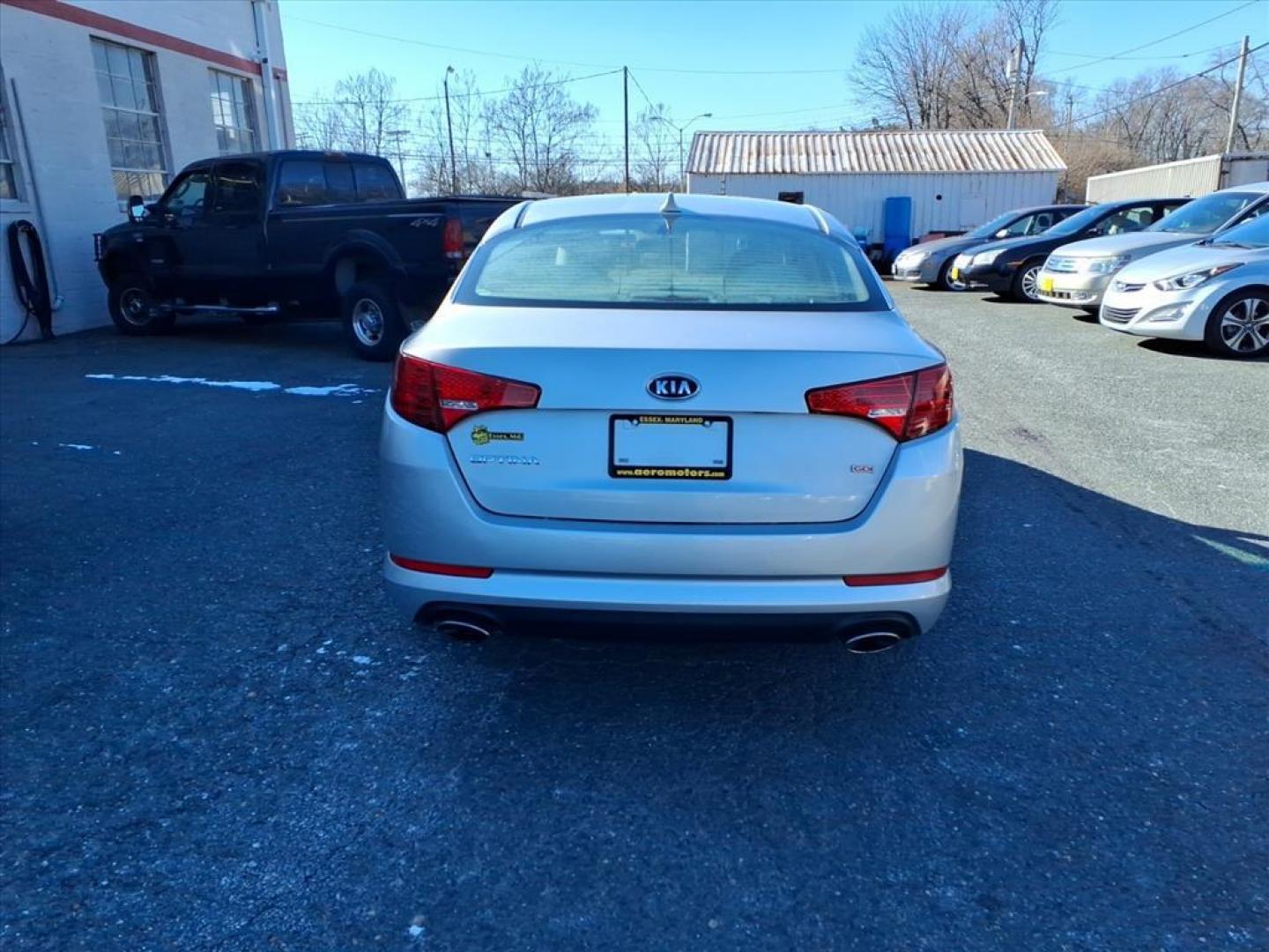 2012 Bright Silver Kia Optima LX (5XXGM4A70CG) with an 2.4L 2.4L I4 200hp 186ft. lbs. Fuel Injected engine, 6-Speed Automatic Sportmatic transmission, located at 50 Eastern Blvd., Essex, MD, 21221, (410) 686-3444, 39.304367, -76.484947 - Photo#2
