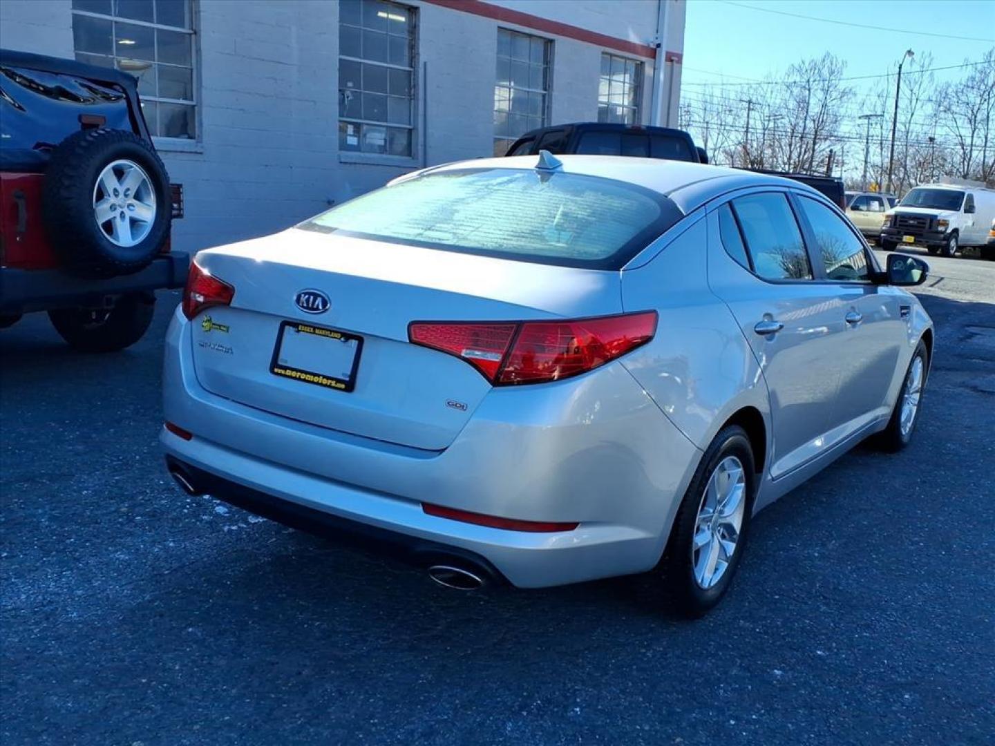2012 Bright Silver Kia Optima LX (5XXGM4A70CG) with an 2.4L 2.4L I4 200hp 186ft. lbs. Fuel Injected engine, 6-Speed Automatic Sportmatic transmission, located at 50 Eastern Blvd., Essex, MD, 21221, (410) 686-3444, 39.304367, -76.484947 - Photo#3