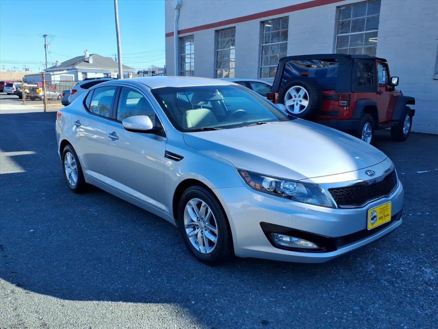 2012 Bright Silver Kia Optima LX (5XXGM4A70CG) with an 2.4L 2.4L I4 200hp 186ft. lbs. Fuel Injected engine, 6-Speed Automatic Sportmatic transmission, located at 50 Eastern Blvd., Essex, MD, 21221, (410) 686-3444, 39.304367, -76.484947 - Photo#5
