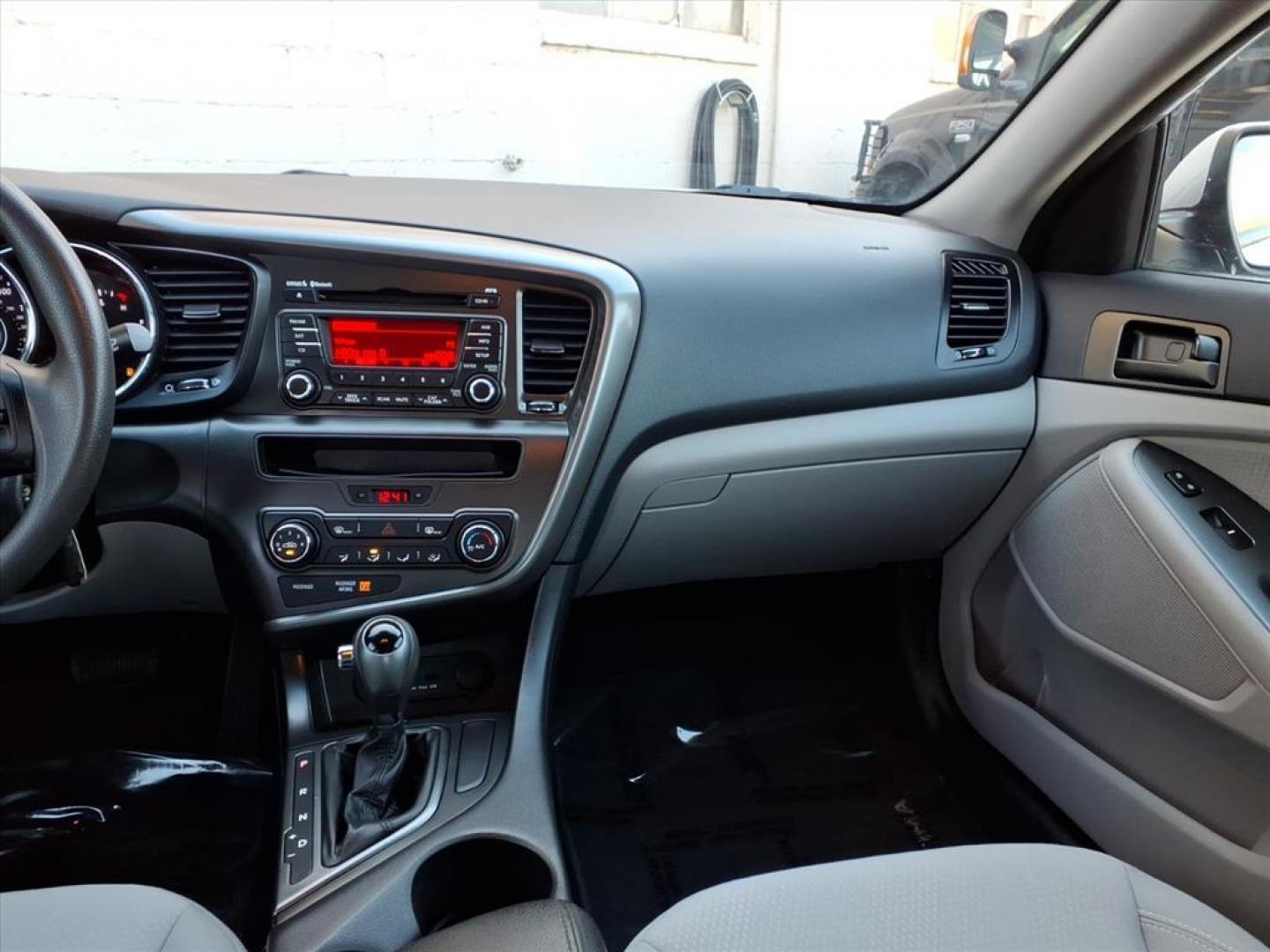 2012 Bright Silver Kia Optima LX (5XXGM4A70CG) with an 2.4L 2.4L I4 200hp 186ft. lbs. Fuel Injected engine, 6-Speed Automatic Sportmatic transmission, located at 50 Eastern Blvd., Essex, MD, 21221, (410) 686-3444, 39.304367, -76.484947 - Photo#14