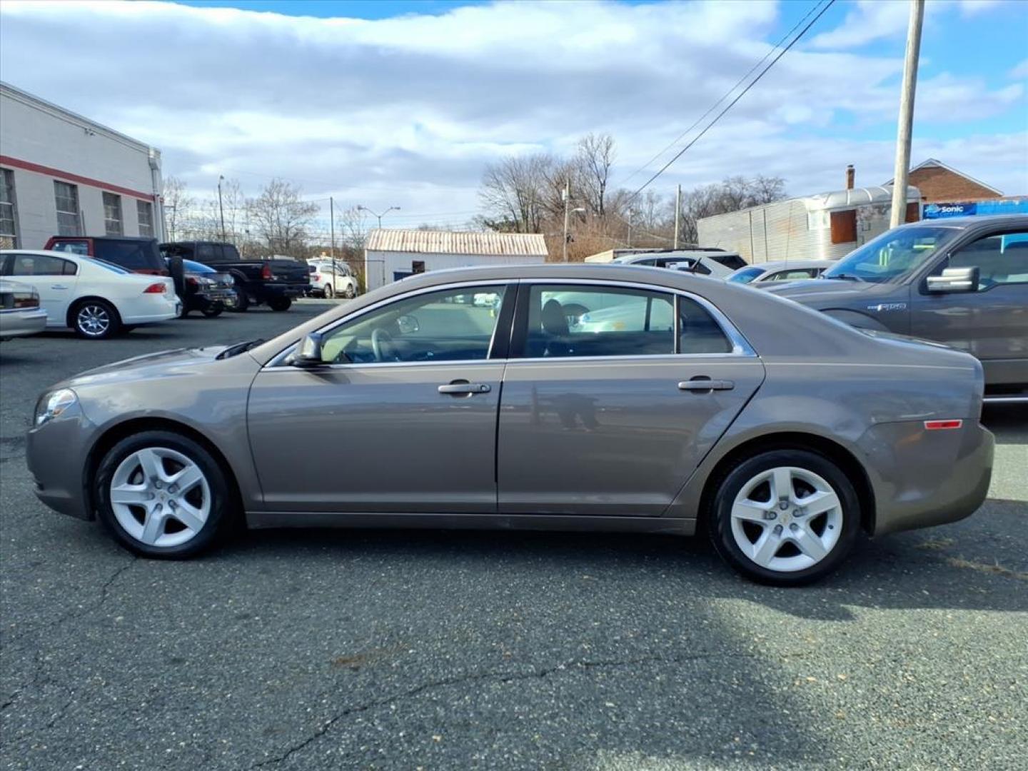 2011 Mocha Steel Metallic Chevrolet Malibu LS (1G1ZB5E11BF) with an 2.4L 4 Cylinder Sequential-Port F.I. engine, 4CYL transmission, located at 50 Eastern Blvd., Essex, MD, 21221, (410) 686-3444, 39.304367, -76.484947 - Photo#1