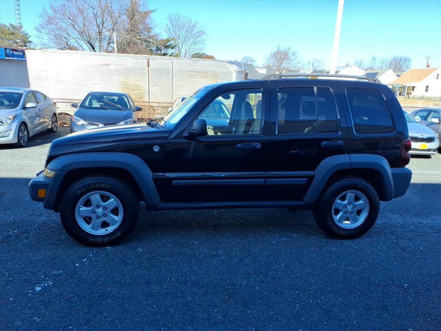 2005 Black Clearcoat Jeep Liberty Sport (1J4GL48K75W) with an 3.7L 6 Cylinder Fuel Injected engine, Automatic transmission, located at 50 Eastern Blvd., Essex, MD, 21221, (410) 686-3444, 39.304367, -76.484947 - Photo#1
