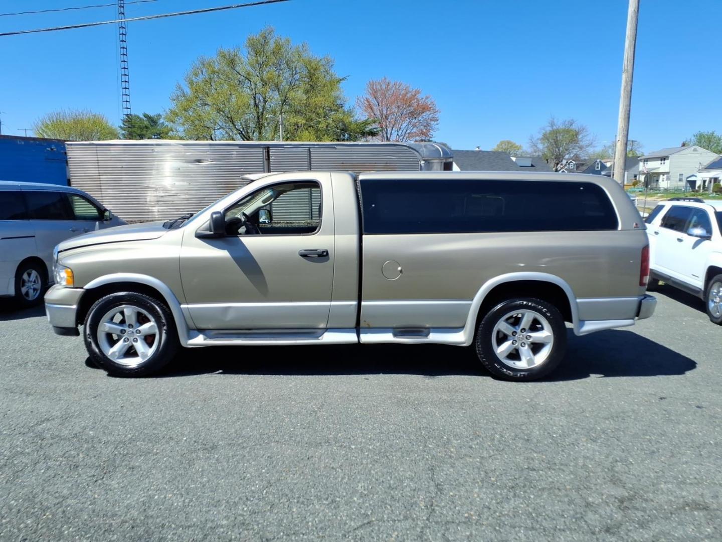 2003 Tan Dodge Ram 1500 ST (1D7HU16N73J) with an 4.7L 4.7L V8 240hp 300ft. lbs. Fuel Injected engine, 5-Speed Automatic transmission, located at 50 Eastern Blvd., Essex, MD, 21221, (410) 686-3444, 39.304367, -76.484947 - Photo#1