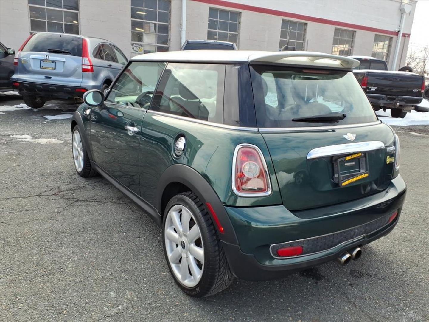 2007 British Racing Green Metallic MINI Cooper S (WMWMF73527T) with an 1.6L 1.6L Turbocharged I4 172hp 177ft. lbs. Turbocharged engine, 6-Speed Manual transmission, located at 50 Eastern Blvd., Essex, MD, 21221, (410) 686-3444, 39.304367, -76.484947 - Photo#2