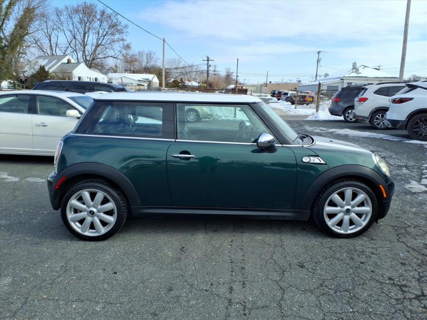 2007 British Racing Green Metallic MINI Cooper S (WMWMF73527T) with an 1.6L 1.6L Turbocharged I4 172hp 177ft. lbs. Turbocharged engine, 6-Speed Manual transmission, located at 50 Eastern Blvd., Essex, MD, 21221, (410) 686-3444, 39.304367, -76.484947 - Photo#5
