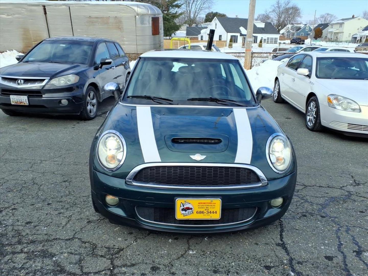 2007 British Racing Green Metallic MINI Cooper S (WMWMF73527T) with an 1.6L 1.6L Turbocharged I4 172hp 177ft. lbs. Turbocharged engine, 6-Speed Manual transmission, located at 50 Eastern Blvd., Essex, MD, 21221, (410) 686-3444, 39.304367, -76.484947 - Photo#7
