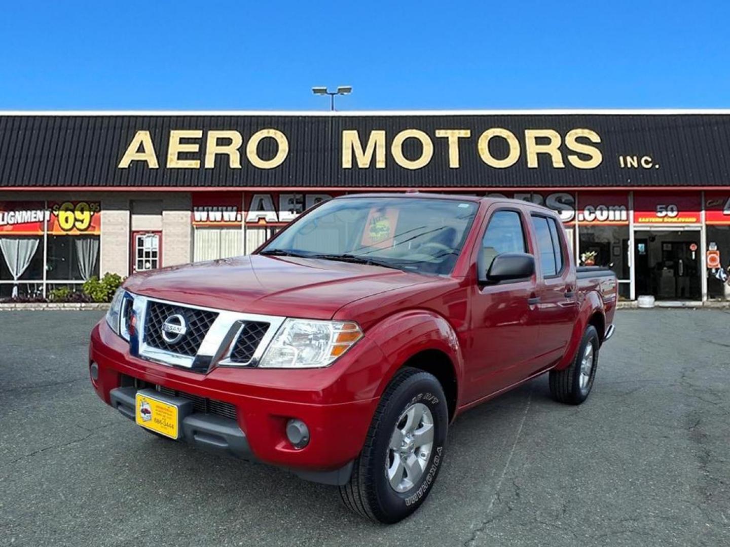 2012 Red Brick Nissan Frontier SL (1N6AD0ER1CC) with an 4.0L 4.0L V6 261hp 281ft. lbs. Fuel Injected engine, 5-Speed Automatic transmission, located at 50 Eastern Blvd., Essex, MD, 21221, (410) 686-3444, 39.304367, -76.484947 - Photo#0