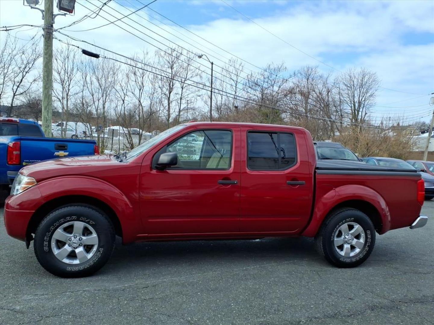 2012 Red Brick Nissan Frontier SL (1N6AD0ER1CC) with an 4.0L 4.0L V6 261hp 281ft. lbs. Fuel Injected engine, 5-Speed Automatic transmission, located at 50 Eastern Blvd., Essex, MD, 21221, (410) 686-3444, 39.304367, -76.484947 - Photo#1