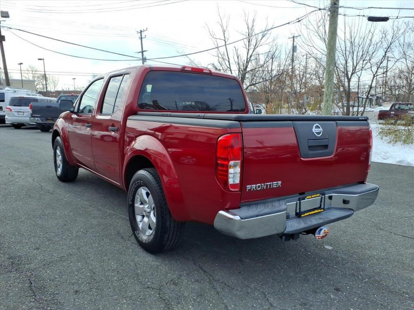 2012 Red Brick Nissan Frontier SL (1N6AD0ER1CC) with an 4.0L 4.0L V6 261hp 281ft. lbs. Fuel Injected engine, 5-Speed Automatic transmission, located at 50 Eastern Blvd., Essex, MD, 21221, (410) 686-3444, 39.304367, -76.484947 - Photo#2