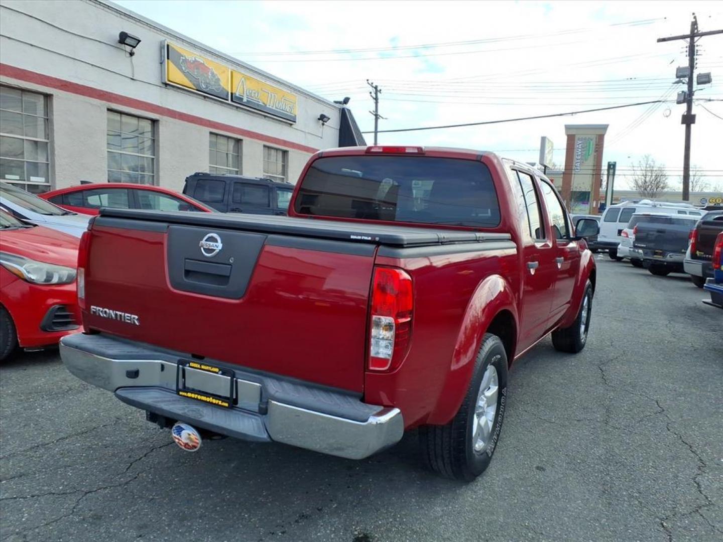 2012 Red Brick Nissan Frontier SL (1N6AD0ER1CC) with an 4.0L 4.0L V6 261hp 281ft. lbs. Fuel Injected engine, 5-Speed Automatic transmission, located at 50 Eastern Blvd., Essex, MD, 21221, (410) 686-3444, 39.304367, -76.484947 - Photo#4
