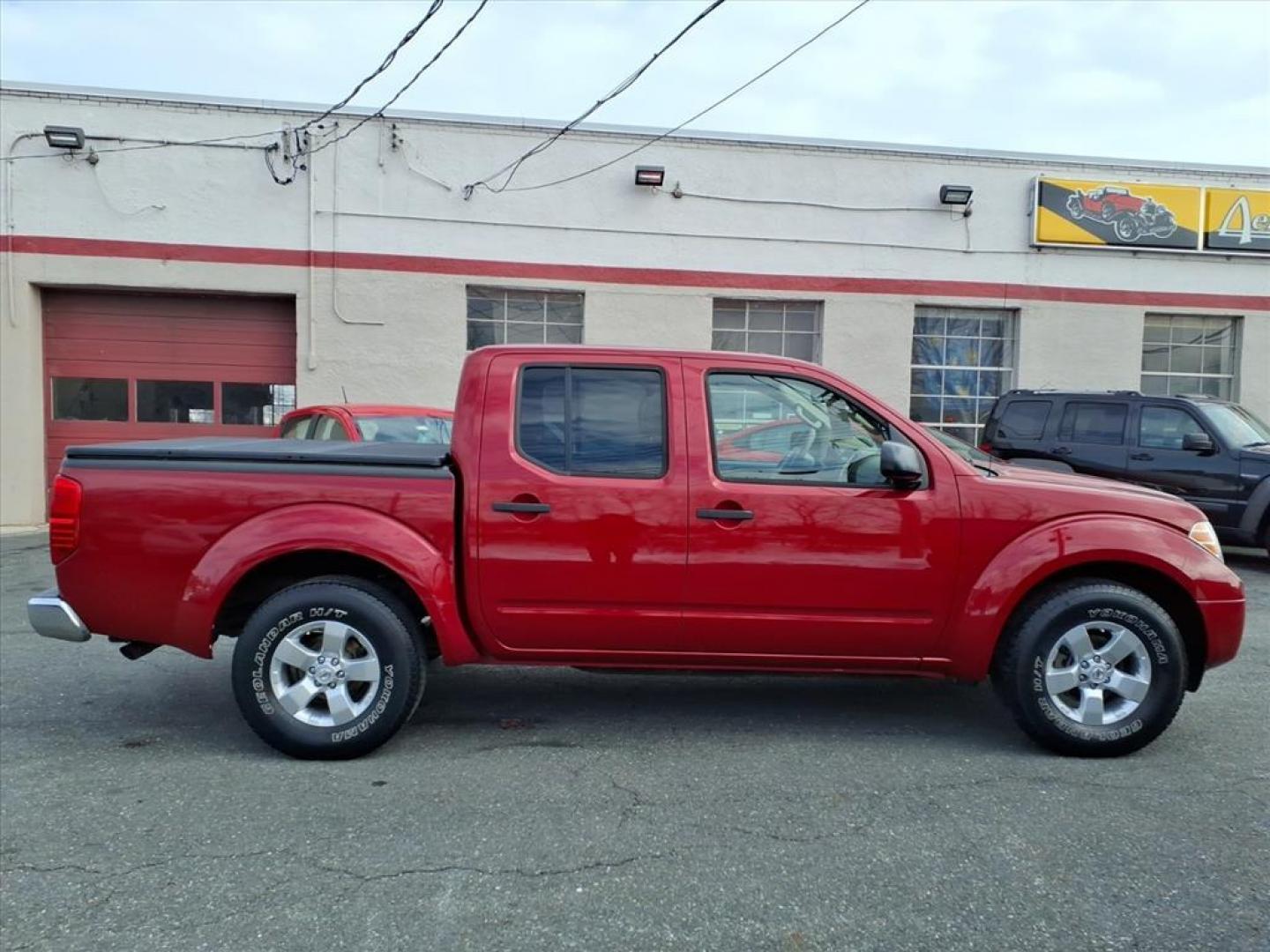 2012 Red Brick Nissan Frontier SL (1N6AD0ER1CC) with an 4.0L 4.0L V6 261hp 281ft. lbs. Fuel Injected engine, 5-Speed Automatic transmission, located at 50 Eastern Blvd., Essex, MD, 21221, (410) 686-3444, 39.304367, -76.484947 - Photo#5