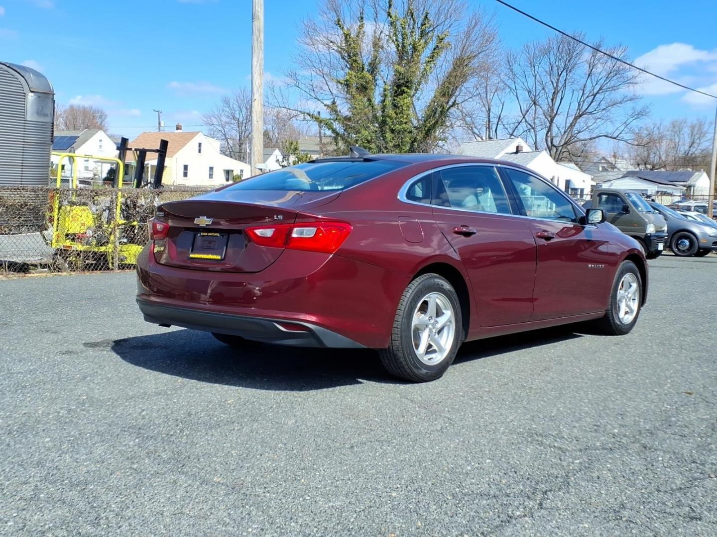 2016 Red Chevrolet Malibu LS (1G1ZB5ST8GF) with an 1.5L 4 Cylinder Turbocharged engine, 4CYL transmission, located at 50 Eastern Blvd., Essex, MD, 21221, (410) 686-3444, 39.304367, -76.484947 - Photo#4