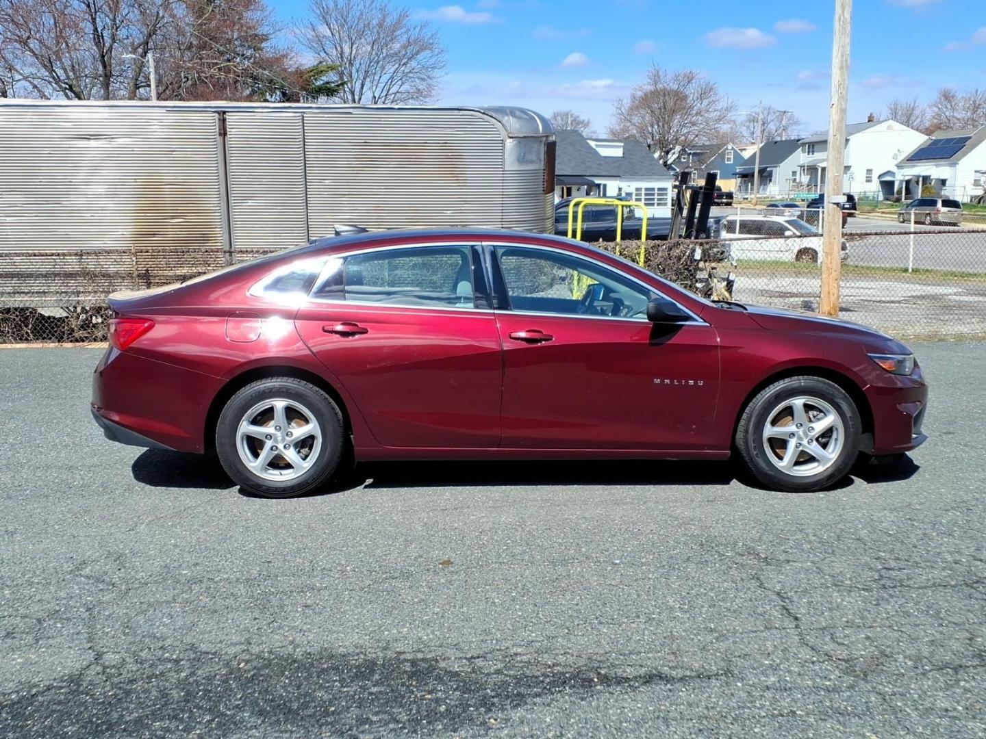 2016 Red Chevrolet Malibu LS (1G1ZB5ST8GF) with an 1.5L 4 Cylinder Turbocharged engine, 4CYL transmission, located at 50 Eastern Blvd., Essex, MD, 21221, (410) 686-3444, 39.304367, -76.484947 - Photo#5