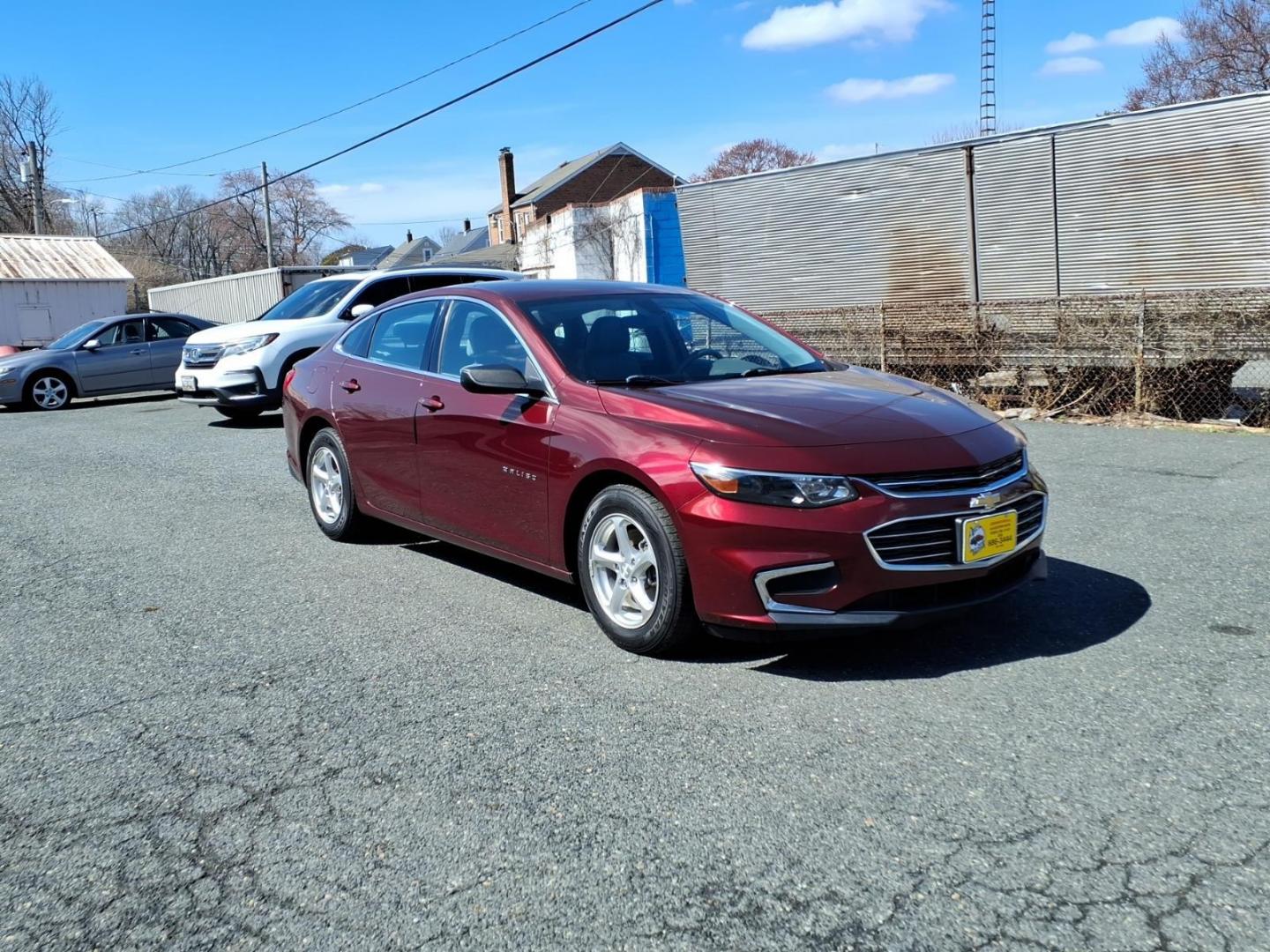 2016 Red Chevrolet Malibu LS (1G1ZB5ST8GF) with an 1.5L 4 Cylinder Turbocharged engine, 4CYL transmission, located at 50 Eastern Blvd., Essex, MD, 21221, (410) 686-3444, 39.304367, -76.484947 - Photo#6