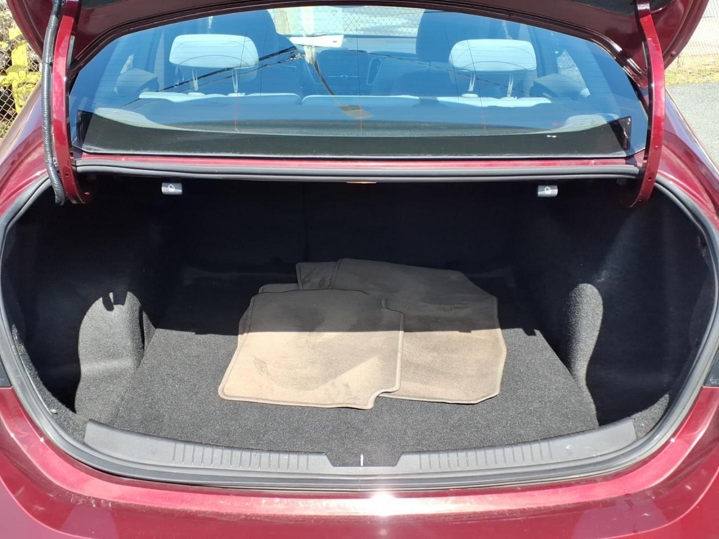 2016 Red Chevrolet Malibu LS (1G1ZB5ST8GF) with an 1.5L 4 Cylinder Turbocharged engine, 4CYL transmission, located at 50 Eastern Blvd., Essex, MD, 21221, (410) 686-3444, 39.304367, -76.484947 - Photo#13