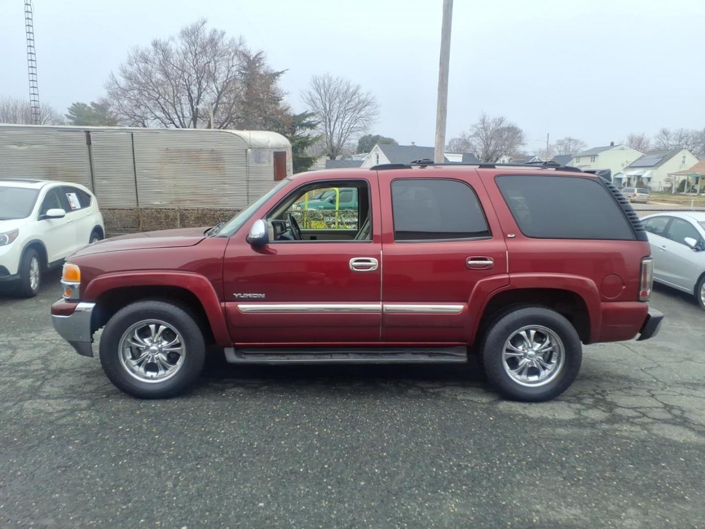 2003 Burg GMC Yukon SLT (1GKEK13Z63J) with an 5.3L 5.3L V8 OHV 16V FI Engine Fuel Injected engine, 4-Speed Automatic transmission, located at 50 Eastern Blvd., Essex, MD, 21221, (410) 686-3444, 39.304367, -76.484947 - Photo#1