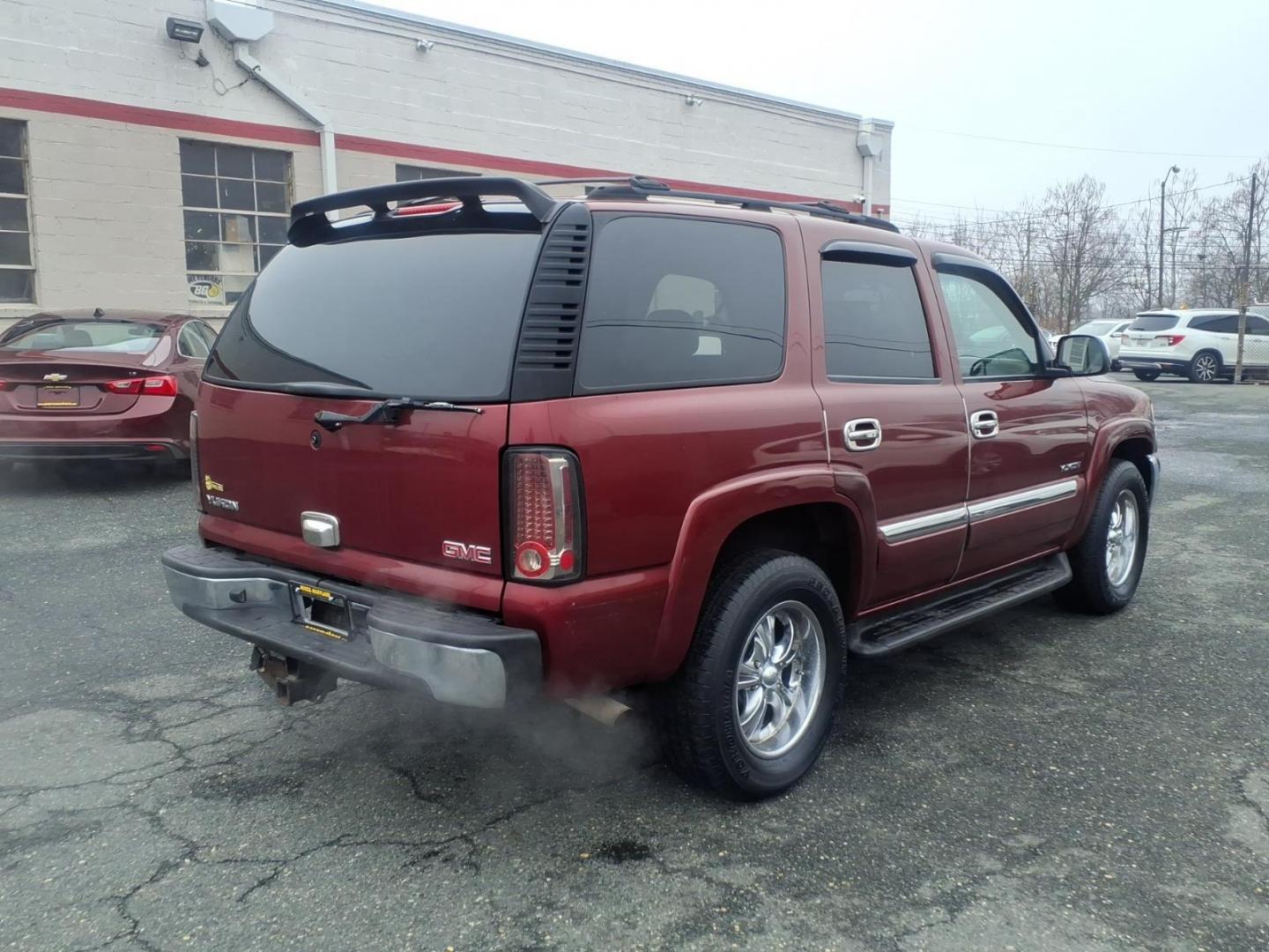2003 Burg GMC Yukon SLT (1GKEK13Z63J) with an 5.3L 5.3L V8 OHV 16V FI Engine Fuel Injected engine, 4-Speed Automatic transmission, located at 50 Eastern Blvd., Essex, MD, 21221, (410) 686-3444, 39.304367, -76.484947 - Photo#4