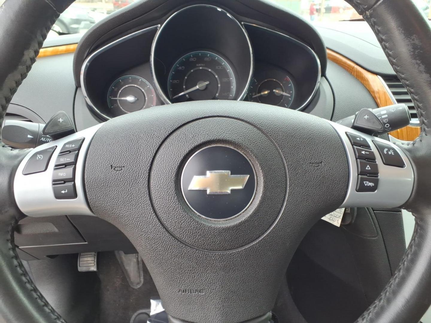 2009 Blue Chevrolet Malibu LT (1G1ZJ577594) with an 3.6L 3.6L V6 252hp 251ft. lbs. Sequential-Port F.I. engine, 6-Speed Shiftable Automatic transmission, located at 50 Eastern Blvd., Essex, MD, 21221, (410) 686-3444, 39.304367, -76.484947 - Photo#21