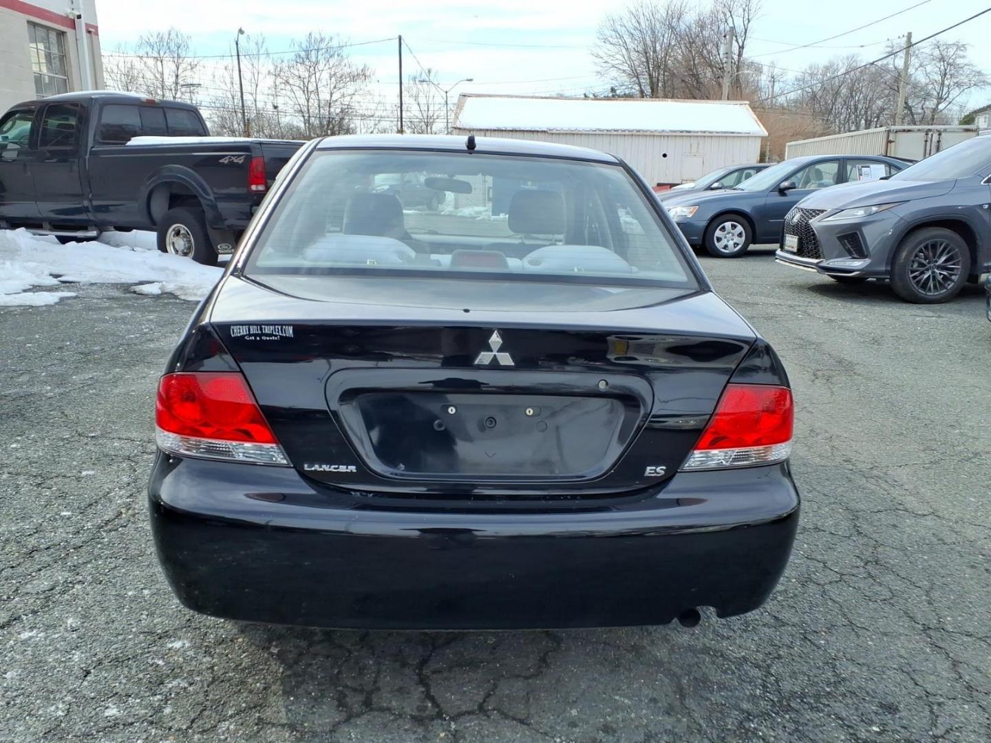 2005 Black Mitsubishi Lancer ES (JA3AJ26E75U) with an 2.0L 4 Cylinder Fuel Injected engine, Automatic transmission, located at 50 Eastern Blvd., Essex, MD, 21221, (410) 686-3444, 39.304367, -76.484947 - Photo#3