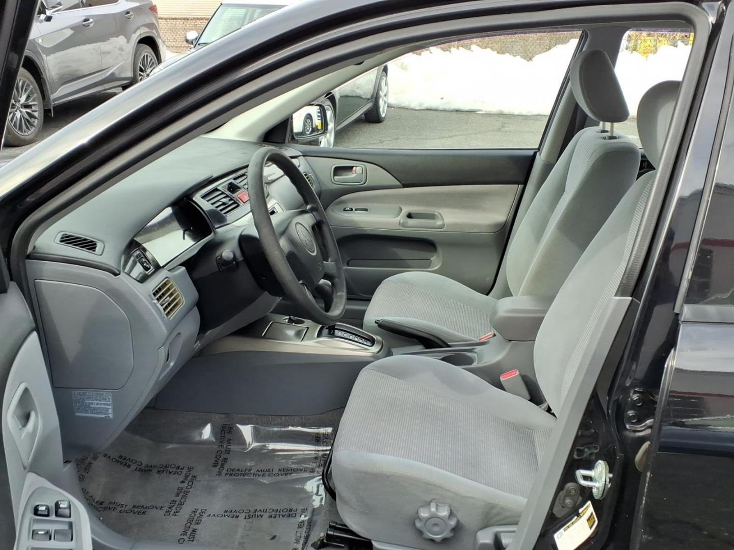 2005 Black Mitsubishi Lancer ES (JA3AJ26E75U) with an 2.0L 4 Cylinder Fuel Injected engine, Automatic transmission, located at 50 Eastern Blvd., Essex, MD, 21221, (410) 686-3444, 39.304367, -76.484947 - Photo#7