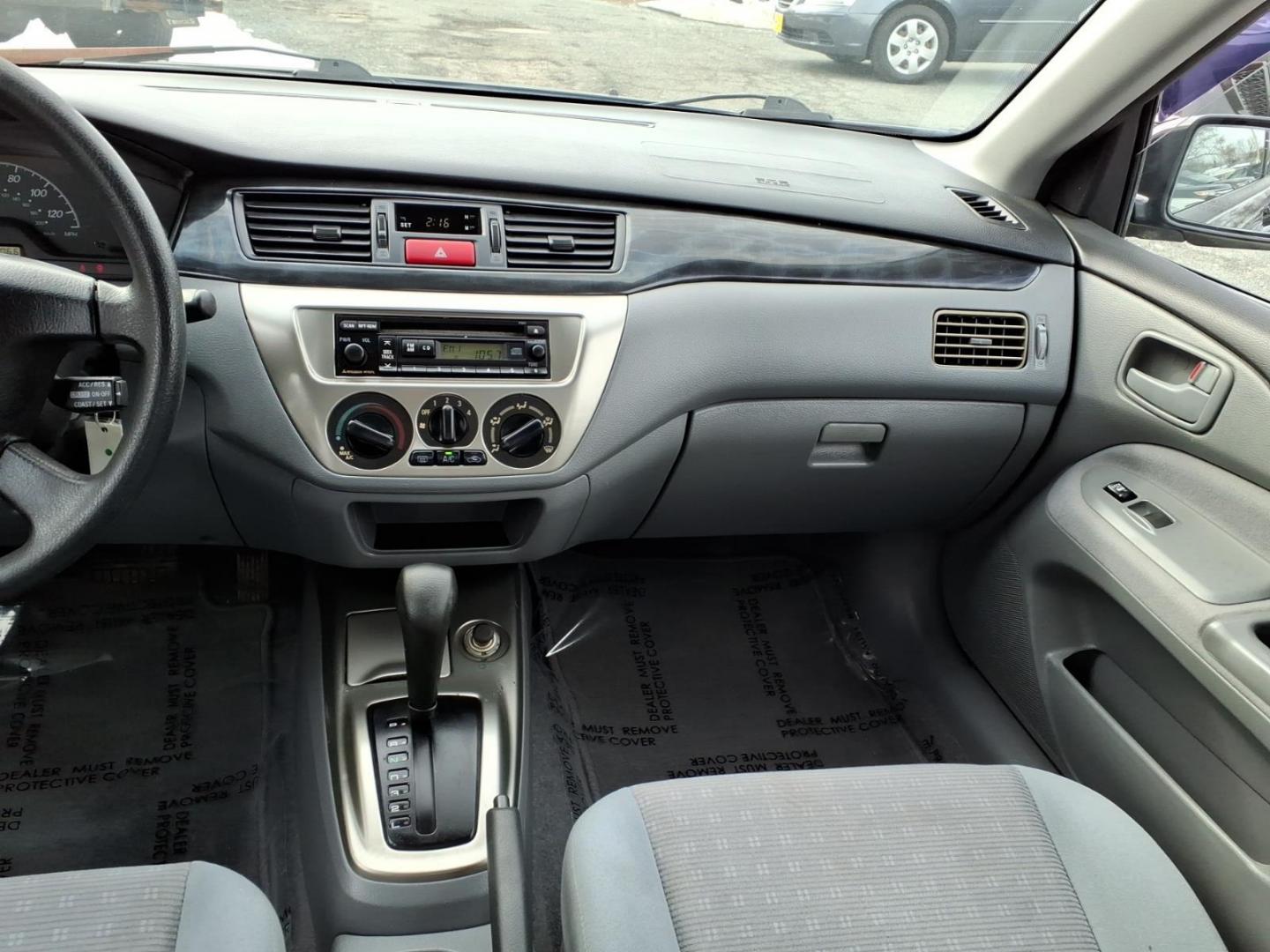 2005 Black Mitsubishi Lancer ES (JA3AJ26E75U) with an 2.0L 4 Cylinder Fuel Injected engine, Automatic transmission, located at 50 Eastern Blvd., Essex, MD, 21221, (410) 686-3444, 39.304367, -76.484947 - Photo#11