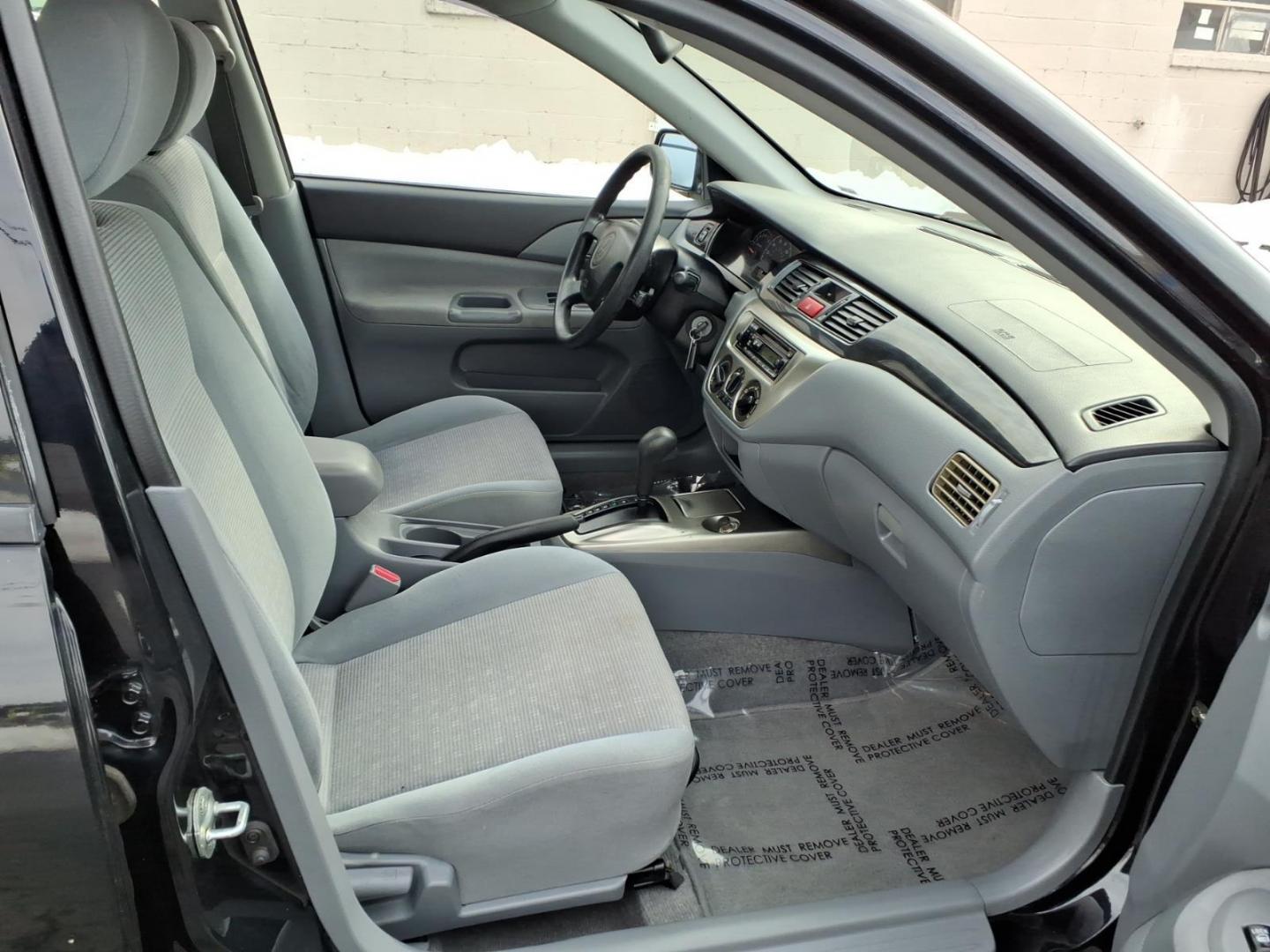 2005 Black Mitsubishi Lancer ES (JA3AJ26E75U) with an 2.0L 4 Cylinder Fuel Injected engine, Automatic transmission, located at 50 Eastern Blvd., Essex, MD, 21221, (410) 686-3444, 39.304367, -76.484947 - Photo#12