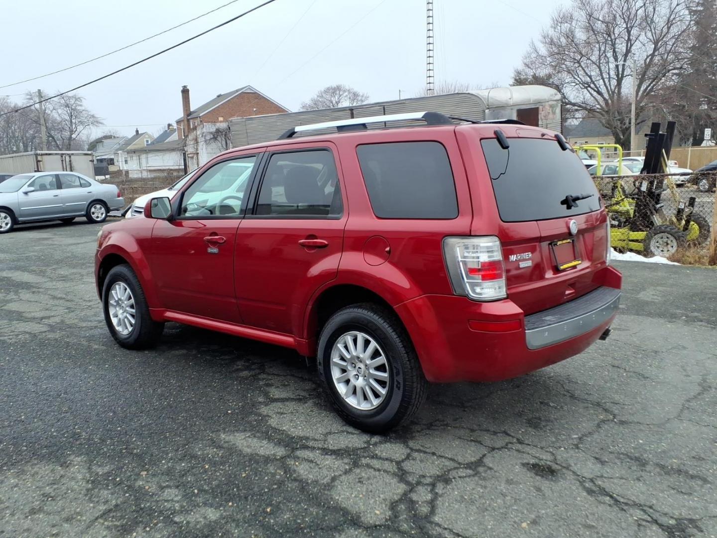 2010 Red Mercury Mariner Premier I4 (4M2CN8H73AK) with an 2.5L Duratec 2.5L I4 171hp 171ft. lbs. Sequential-Port F.I. engine, 6-Speed Automatic transmission, located at 50 Eastern Blvd., Essex, MD, 21221, (410) 686-3444, 39.304367, -76.484947 - Photo#2