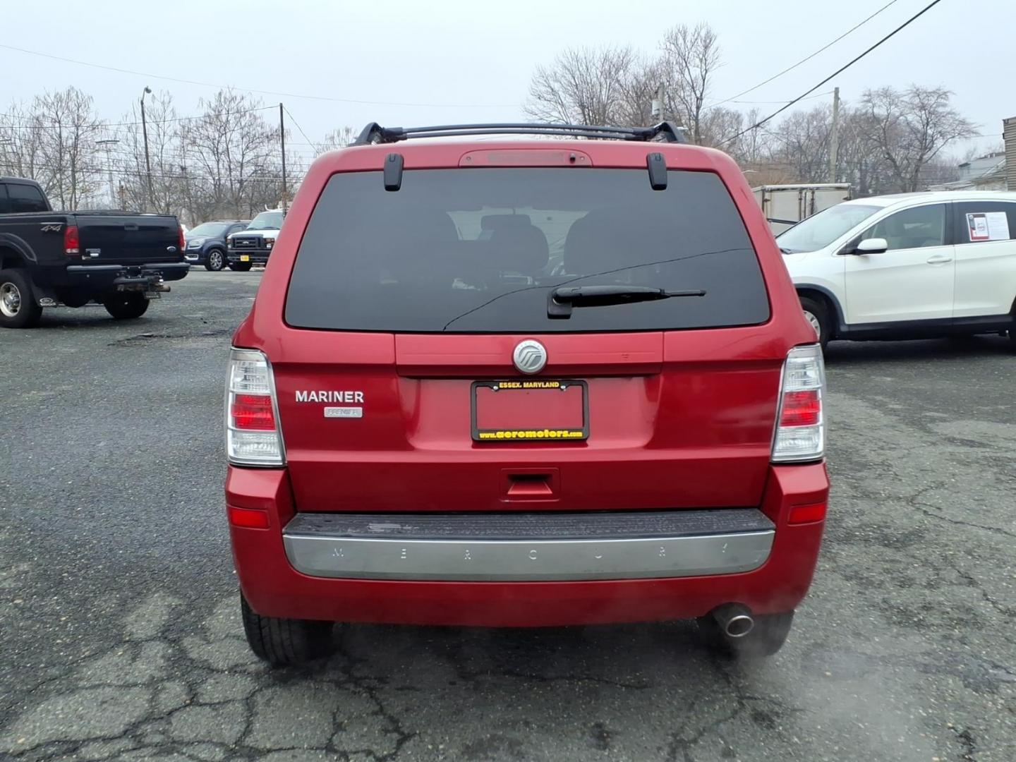 2010 Red Mercury Mariner Premier I4 (4M2CN8H73AK) with an 2.5L Duratec 2.5L I4 171hp 171ft. lbs. Sequential-Port F.I. engine, 6-Speed Automatic transmission, located at 50 Eastern Blvd., Essex, MD, 21221, (410) 686-3444, 39.304367, -76.484947 - Photo#3