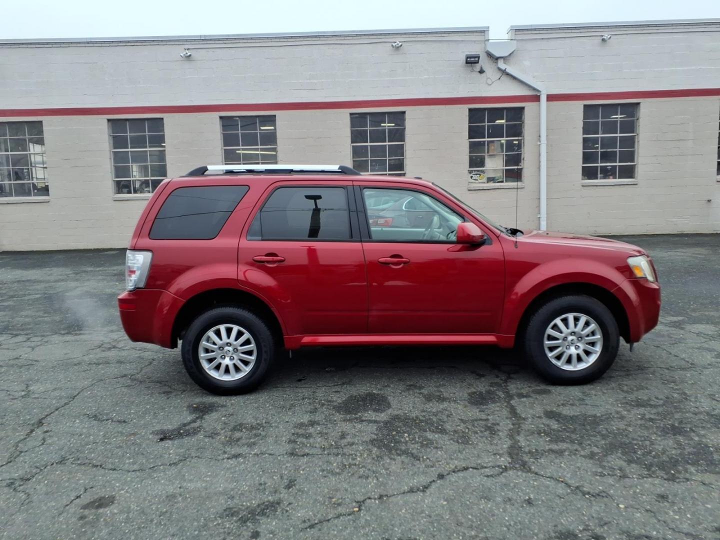 2010 Red Mercury Mariner Premier I4 (4M2CN8H73AK) with an 2.5L Duratec 2.5L I4 171hp 171ft. lbs. Sequential-Port F.I. engine, 6-Speed Automatic transmission, located at 50 Eastern Blvd., Essex, MD, 21221, (410) 686-3444, 39.304367, -76.484947 - Photo#5