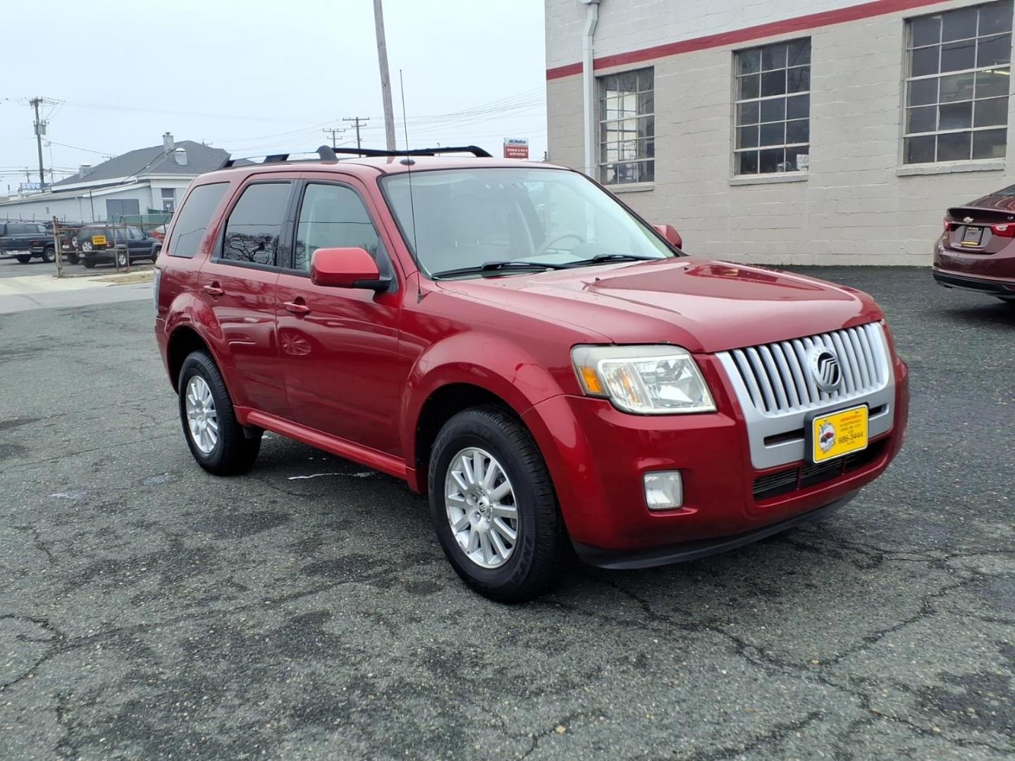 2010 Red Mercury Mariner Premier I4 (4M2CN8H73AK) with an 2.5L Duratec 2.5L I4 171hp 171ft. lbs. Sequential-Port F.I. engine, 6-Speed Automatic transmission, located at 50 Eastern Blvd., Essex, MD, 21221, (410) 686-3444, 39.304367, -76.484947 - Photo#6