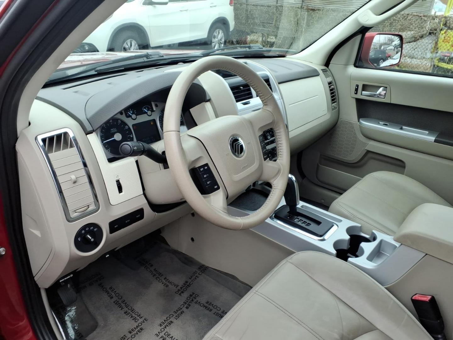 2010 Red Mercury Mariner Premier I4 (4M2CN8H73AK) with an 2.5L Duratec 2.5L I4 171hp 171ft. lbs. Sequential-Port F.I. engine, 6-Speed Automatic transmission, located at 50 Eastern Blvd., Essex, MD, 21221, (410) 686-3444, 39.304367, -76.484947 - Photo#8