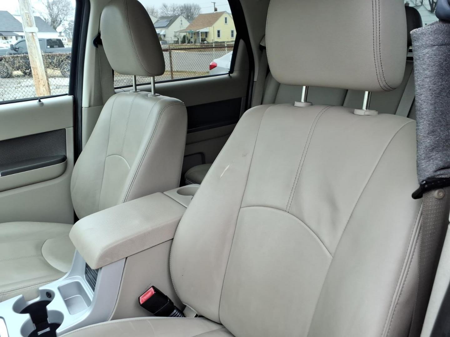 2010 Red Mercury Mariner Premier I4 (4M2CN8H73AK) with an 2.5L Duratec 2.5L I4 171hp 171ft. lbs. Sequential-Port F.I. engine, 6-Speed Automatic transmission, located at 50 Eastern Blvd., Essex, MD, 21221, (410) 686-3444, 39.304367, -76.484947 - Photo#9