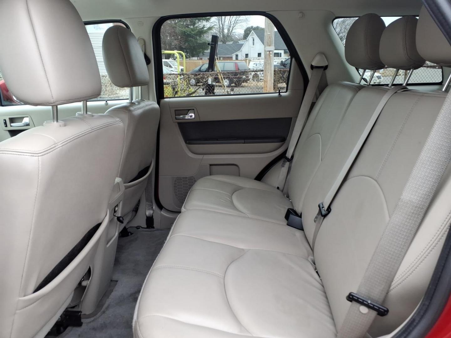 2010 Red Mercury Mariner Premier I4 (4M2CN8H73AK) with an 2.5L Duratec 2.5L I4 171hp 171ft. lbs. Sequential-Port F.I. engine, 6-Speed Automatic transmission, located at 50 Eastern Blvd., Essex, MD, 21221, (410) 686-3444, 39.304367, -76.484947 - Photo#11