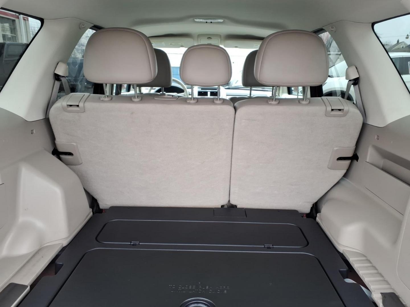 2010 Red Mercury Mariner Premier I4 (4M2CN8H73AK) with an 2.5L Duratec 2.5L I4 171hp 171ft. lbs. Sequential-Port F.I. engine, 6-Speed Automatic transmission, located at 50 Eastern Blvd., Essex, MD, 21221, (410) 686-3444, 39.304367, -76.484947 - Photo#12